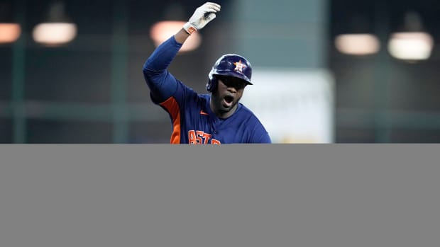 Yordan Alvarez celebrates his two-run home run in Game 2 of the ALDS